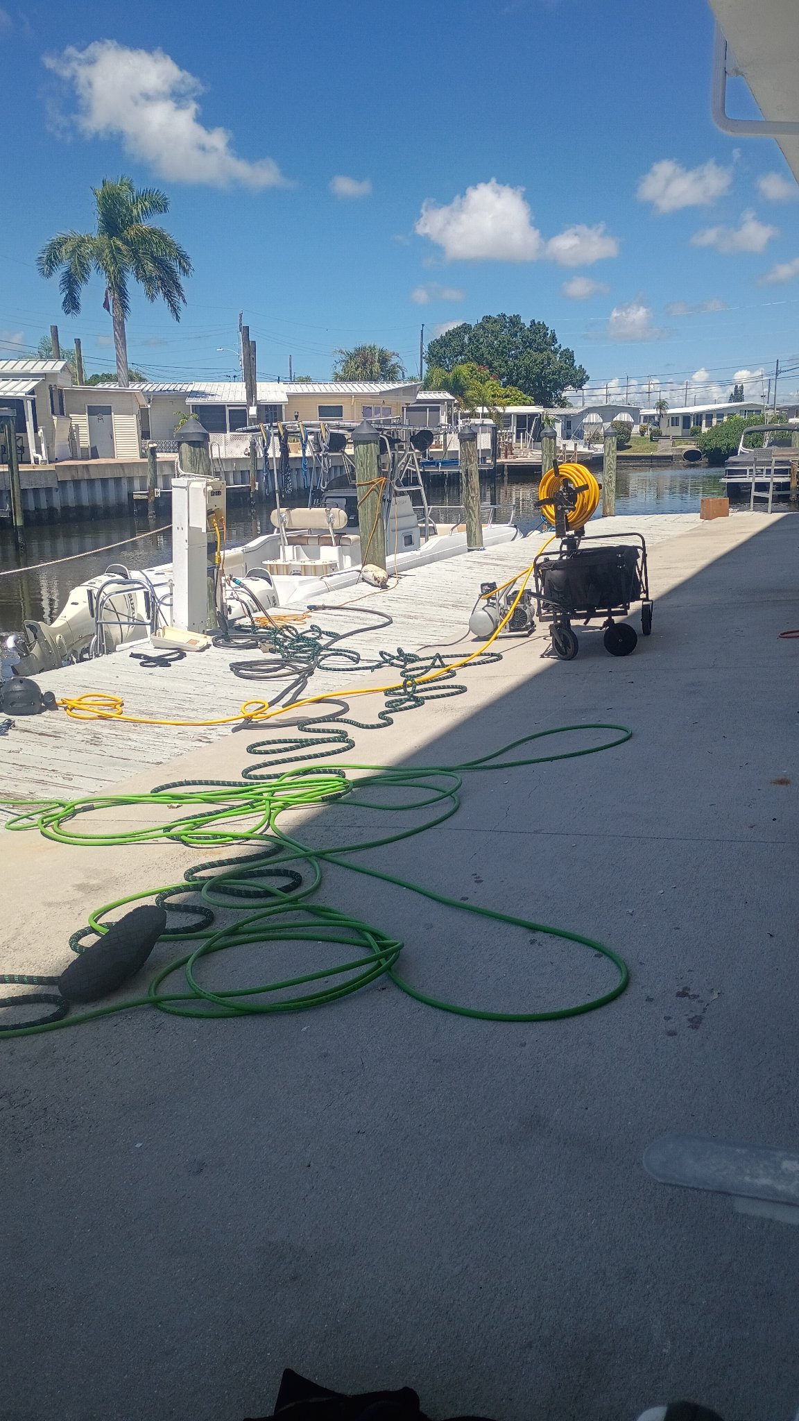 Work boat and dive equipment positioned on the water